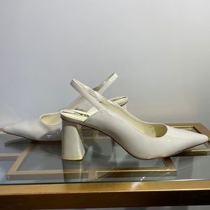 ******SOLD*****Wide heel patent leather sling backs. Never worn.